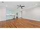 Spacious living room with wood floors featuring a bar area with light blue cabinetry at 686 Amsterdam Ne Ave, Atlanta, GA 30306