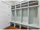 Mudroom with custom built-ins featuring cubbies, hooks, bench, and overhead baskets at 686 Amsterdam Ne Ave, Atlanta, GA 30306