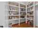 Walk-in pantry with open shelving, hardwood floors, and ample storage space at 686 Amsterdam Ne Ave, Atlanta, GA 30306
