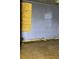 Damaged room featuring boarded window and water stains on the walls at 1405 Mote Rd, Covington, GA 30016