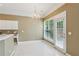 Bright eat-in kitchen features a chandelier and a door to the outdoor area at 1815 Montcliff Dr, Cumming, GA 30041