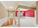 Welcoming entry with hardwood floors leading to a formal dining area and open spaces at 1815 Montcliff Dr, Cumming, GA 30041