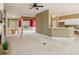 Spacious living room with neutral carpet, leads to entry and eat-in kitchen at 1815 Montcliff Dr, Cumming, GA 30041