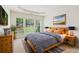 Serene main bedroom with tray ceilings, natural light, and cozy decor for relaxation at 1815 Montcliff Dr, Cumming, GA 30041