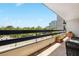 Balcony with outdoor seating and green treeline views at 2660 Peachtree Rd # 7F, Atlanta, GA 30305