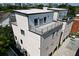 Modern townhome featuring clean lines, multiple balconies, and a rooftop terrace offering stunning city views at 420-D Parkway Ne Dr, Atlanta, GA 30308