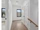 Hallway with wood floors, windows, and white trim at 420-D Parkway Ne Dr, Atlanta, GA 30308