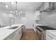Modern kitchen with stainless steel appliances and a large island at 420-D Parkway Ne Dr, Atlanta, GA 30308