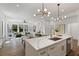 Open-concept kitchen featuring a large island with quartz countertop and pendant lighting at 420-D Parkway Ne Dr, Atlanta, GA 30308