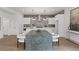 Beautiful kitchen with white cabinets, a large gray island, and modern appliances at 420-D Parkway Ne Dr, Atlanta, GA 30308