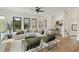 Contemporary living room featuring plush seating, stylish decor, and plenty of natural light from large windows at 420-D Parkway Ne Dr, Atlanta, GA 30308