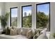 Bright living room featuring a comfortable white sofa and decorative pillows, perfect for relaxation at 420-D Parkway Ne Dr, Atlanta, GA 30308