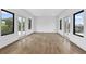 Spacious room with hardwood floors and multiple windows offering nice views at 420-D Parkway Ne Dr, Atlanta, GA 30308