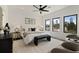 Relaxing primary bedroom with ceiling fan, natural light, and city views at 420-D Parkway Ne Dr, Atlanta, GA 30308