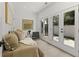 Sitting room with hardwood floors and access to balcony at 420-D Parkway Ne Dr, Atlanta, GA 30308