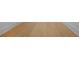 Light-colored hardwood flooring with white baseboards at 50 Maple St, Roswell, GA 30075
