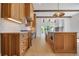 Gourmet kitchen featuring custom cabinetry, stainless steel appliances, and a center island at 50 Maple St, Roswell, GA 30075