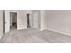 Neutral bedroom with multiple entryways and plush carpeting at 105 Tanners Ct, Covington, GA 30016