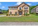Charming two-story home with a well-manicured lawn and inviting curb appeal at 105 Tanners Ct, Covington, GA 30016