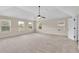Large main bedroom with ample natural light showcases a comfortable and inviting space at 105 Tanners Ct, Covington, GA 30016