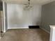 A dining room with a chandelier, gray walls and carpeted floors at 14301 Waldrop Cv, Decatur, GA 30034