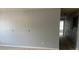 Living room view with gray walls, carpeted floor and hallway access at 14301 Waldrop Cv, Decatur, GA 30034
