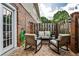 Private outdoor patio area with comfortable seating, perfect for relaxing and entertaining at 2474 Lehaven Dr, Tucker, GA 30084