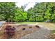 Community park offering picnic tables, play equipment, and lush greenery at 2474 Lehaven Dr, Tucker, GA 30084