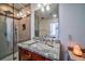 Modern bathroom featuring a sleek glass shower and granite countertop at 57 Forsyth Nw St # 12B, Atlanta, GA 30303
