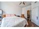 Cozy bedroom with hardwood floors, ceiling fan, and serene decor at 57 Forsyth Nw St # 12B, Atlanta, GA 30303