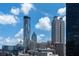 Downtown buildings including the Westin hotel, against a blue sky with scattered clouds at 57 Forsyth Nw St # 12B, Atlanta, GA 30303
