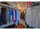 Walk-in closet with ample storage and well-organized shelving at 57 Forsyth Nw St # 12B, Atlanta, GA 30303