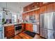 Modern kitchen with granite countertops, custom cabinets, and stainless steel appliances at 57 Forsyth Nw St # 12B, Atlanta, GA 30303