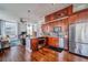 Well-appointed kitchen features stainless appliances, granite counters, and hardwood floors at 57 Forsyth Nw St # 12B, Atlanta, GA 30303