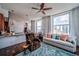 Open-concept living space with hardwood floors, large windows, and comfortable modern furnishings at 57 Forsyth Nw St # 12B, Atlanta, GA 30303