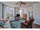 Bright living room features large windows, hardwood floors, and modern furnishings at 57 Forsyth Nw St # 12B, Atlanta, GA 30303