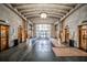Elegant lobby with high ceilings, marble floors, and brass elevator doors at 57 Forsyth Nw St # 12B, Atlanta, GA 30303