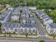 Aerial view of an upscale neighborhood featuring well-maintained streets and modern townhomes at 915 Katie Kerr Drive, Decatur, GA 30030