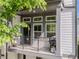 Relaxing balcony with outdoor seating and a grill, perfect for enjoying the neighborhood views at 915 Katie Kerr Drive, Decatur, GA 30030