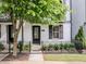 Attractive townhome featuring a secure fenced yard and easy access to sidewalks at 915 Katie Kerr Drive, Decatur, GA 30030
