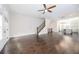 Open concept living area with hardwood floors and a view of the modern kitchen at 915 Katie Kerr Drive, Decatur, GA 30030