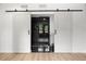 Stunning bathroom with black tiled shower and sliding doors at 2824 Tupelo Se St, Atlanta, GA 30317