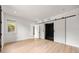 Modern bath with sliding doors, black tiled shower, and natural light at 2824 Tupelo Se St, Atlanta, GA 30317