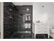 Updated bath featuring black tile, vanity, and shower at 2824 Tupelo Se St, Atlanta, GA 30317
