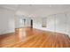 An open, airy bedroom with hardwood floors, recessed lighting, large closets, and bright windows at 2824 Tupelo Se St, Atlanta, GA 30317