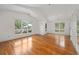 Spacious bedroom features hardwood floors, bright natural light, and neutral walls with bright white trim at 2824 Tupelo Se St, Atlanta, GA 30317