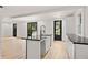 Well-lit kitchen with an island and modern countertops offers an open design at 2824 Tupelo Se St, Atlanta, GA 30317