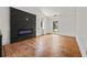 Spacious living room with black fireplace and wood floors at 2824 Tupelo Se St, Atlanta, GA 30317