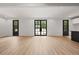 Bright living room with hardwood floors and access to kitchen, perfect for modern living at 2824 Tupelo Se St, Atlanta, GA 30317