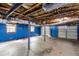 Unfinished basement with exposed ceilings and support beams at 440 Ohern Ct, Stone Mountain, GA 30088